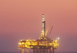 Oil rig platform at twilight off the California coast. High resolution uncropped image.